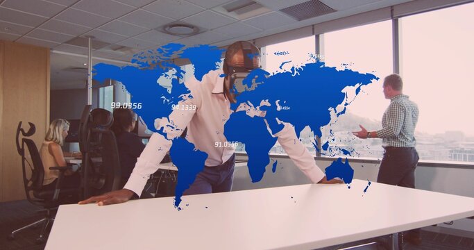 Leaning businessman analyzing world map overlay in corporate office, conference table backdrop - Powered by Adobe