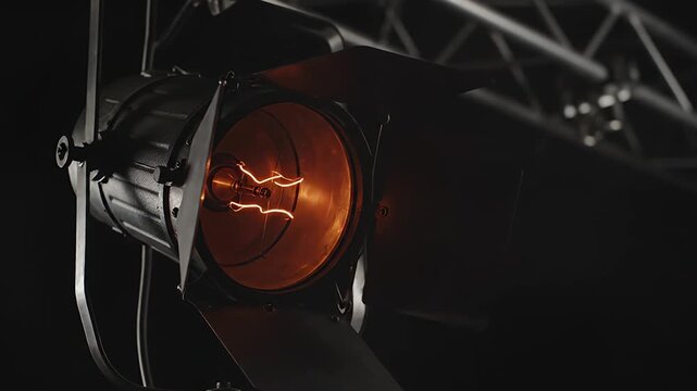 Cinematic Reveal A Dramatic Pan to an Igniting Studio Spotlight. studio film.