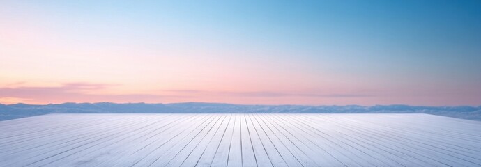 Tranquil winter sunset over snowy wooden deck