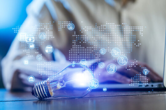 Innovative digital workspace with virtual concepts and light bulb symbolizing creativity and technology advancements