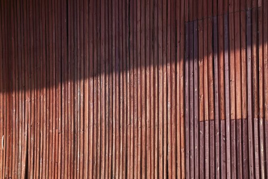 Falun red painted wooden slats of a barn, former paper factory and mill for the production of groundwood pulp board, UNESCO World Heritage Site Factory Village Verla, Maailmanperint&ouml;kohde Verlan puuhiomo ja pahvitehdas, Verla Rapids, Kymenlaakso, near Kouvola, Finland