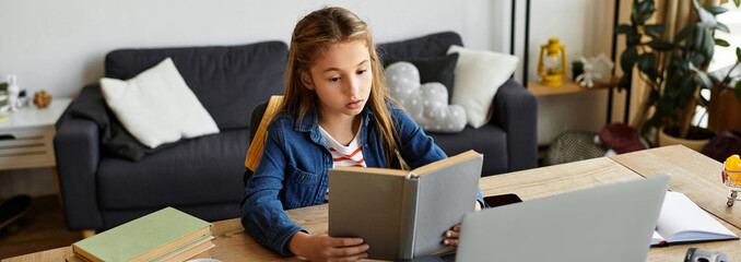 Girl in casual outfit immersed in reading at home during a sunny afternoon