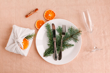 Christmas table setting for christmas dinner, served table with plate, gift, champagne glass, New...