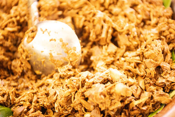 Gudeg, the traditional food from Yogyakarta, is served as a complete set. It includes fried chicken, vegetable stew (lodeh), a chicken egg, and other additional side dishes 