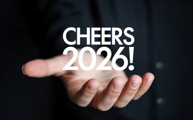 Businessman's Hand Presenting a "Cheers 2026" New Year Greeting