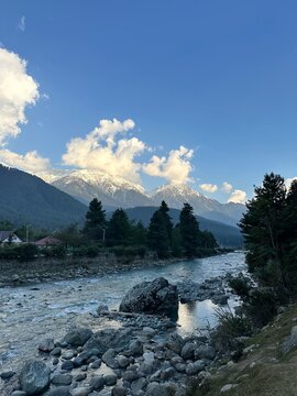 Scenic View of Lidder River and Snow-Capped Himalayas in Pahalgam, Kashmir