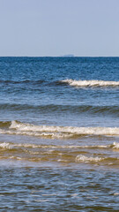 sea waves on the background of blue sky