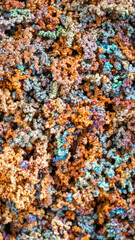 colored copper crystals with a visible texture. background