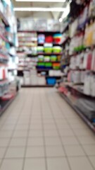 Defocused image of interior shopping mall in Italy.