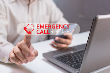 A person is about to make an emergency call using a laptop, with a visible 