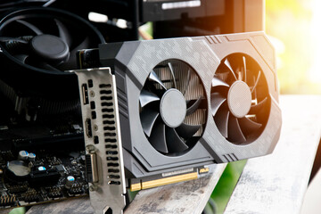 Side view of the motherboard and graphics card are the main components of the computer. © tanit