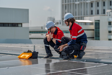 Solar engineer teamwork maintenance energy rooftop technician inspection repair panel installation...