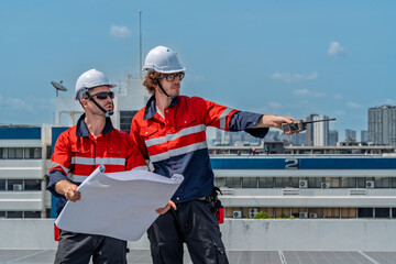 Solar engineer teamwork maintenance energy guide rooftop crew plan sun while supervisor points...