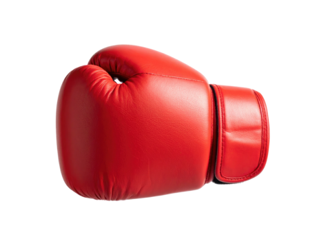 Vivid studio shot of a red leather boxing glove isolated on a solid black background