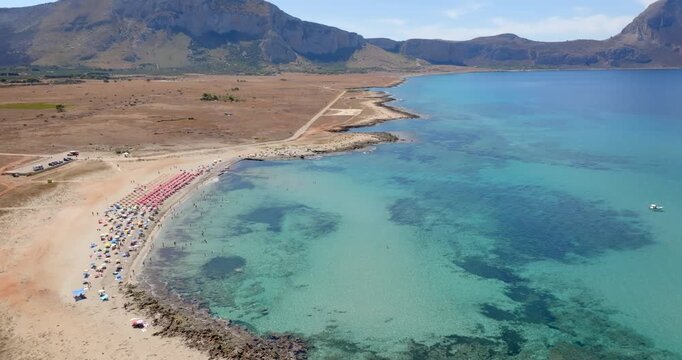 Aerial view of Macari Beach, located near San Vito Lo Capo, in province of Trapani, in Sicily, Italy. It is a beautiful coast with a turquoise and crystalline sea.