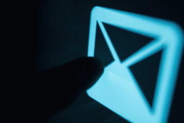 Pixel cursor on a mail icon – detailed screen display imagery.