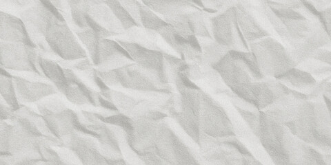 Close up of fine grained white sand with subtle rippled texture and soft shadows creating a natural surface pattern