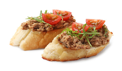 Delicious bruschettas with tuna, tomatoes and arugula isolated on white