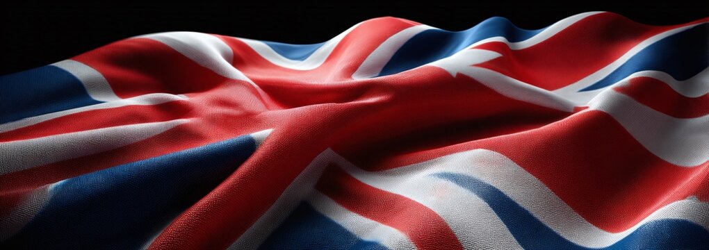 Close Up Union Jack Flag Waving in the Wind with Textile Fabric Texture for Patriotic British Background