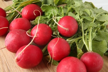 Fresh ripe radishes on table, closeup view