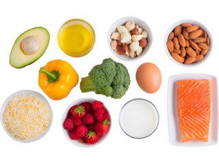 Variety of healthy foods including salmon, fruits, and vegetables isolated on transparent background, symbolizing balanced diet.