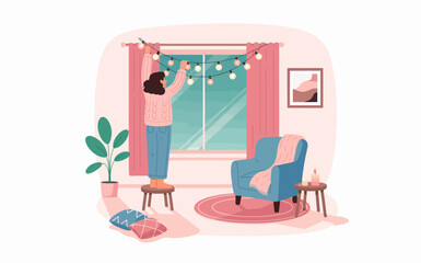Woman decorating cozy living room with string lights preparing for holidays celebration in her beautiful interior