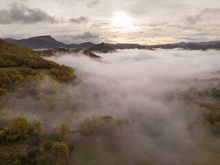 An autumn morning with fog in the valley. Aezkoa Valley, Navarrese Pyrenees