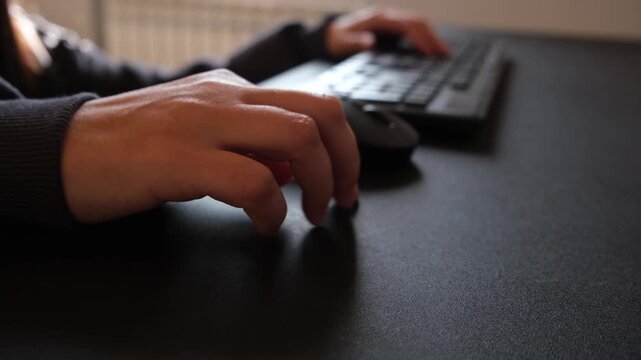 Tapping fingers on office desk while waiting, close-up workplace scene