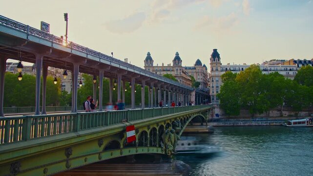 Paris, France - 26.08.2025: The parisian urban subway passes over a bridge. The oldest green metro line, number 6 in Paris. Timelapse
