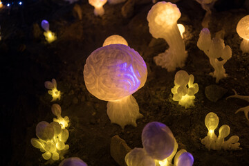 Abstract Miniature of Another Planet with Giant Glowing Mushrooms. A Nighttime Scene on an Alien World, Illuminated by the Soft Glow of Otherworldly Fungi.