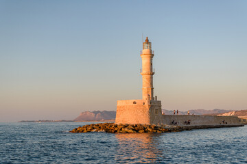 Chania Lighthouse at Sunset on Stone Pier in Crete, Greece
