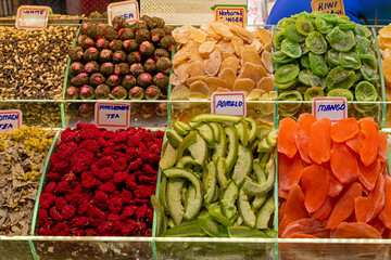 Colorful organic dry fruits and tea flowers piles sold outside on bazaars