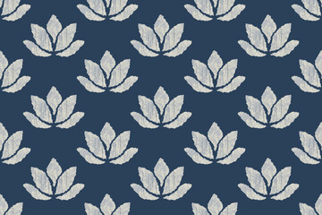 Navy blue damask ikat seamless pattern featuring white lotus flower motifs. ideal for textile design, wallpaper, fashion fabric, home decor, and digital backgrounds.