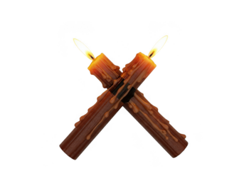 Two lit candles crossed isolated on transparent background