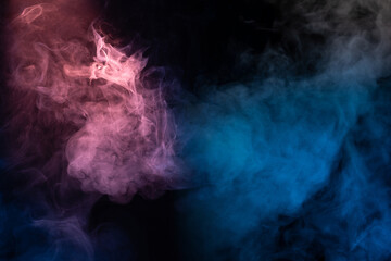 Blue and yellow steam on a black background.