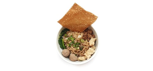 Mie Ayam, Indonesian Chicken Noodle Soup with MeatBalls and Fried Dumpling in a Bowl Isolated on White Background