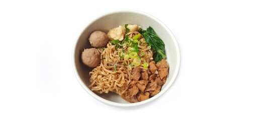 Mie Ayam, Indonesian Chicken Noodle Soup with Meatballs in a Bowl Isolated on White Background