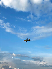 Lone Airplane in the Endless Blue Sky