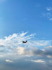 Lone Airplane in the Endless Blue Sky