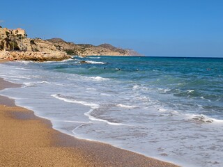 bright sunny coast, peaceful sunny beach setting with warm sunlight illuminating tranquil shoreline