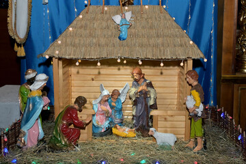 Traditional Christmas nativity scene with Mary and Joseph and baby Jesus in the manger.