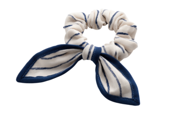 Stylish white scrunchie with blue stripes and an attached bow tie. A chic hair accessory for a fashionable and casual look. background removed