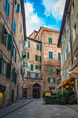 Streets, roofs and towers in the old Tuscany city Florence, Italy