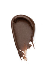 A smear of chocolate on a white isolated background, macro photo