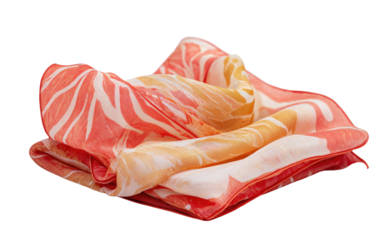 A folded vibrant coral, orange, and white patterned silk scarf, showcasing an elegant abstract or floral design. Perfect for fashion accessories. background removed