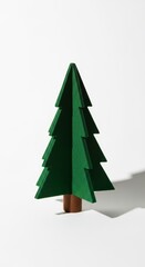 Obraz premium Felt Christmas Tree photo on a solid white background, holiday graphic, Craft