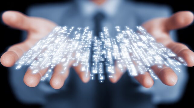 Businessman holding digital data streams in hands