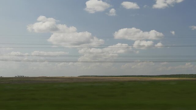 sunny sky shadow time summer day road trip wheat field landscape passenger side window pov panorama 4k