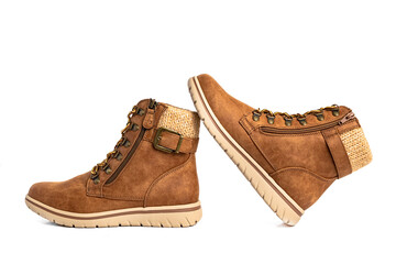 Brown women's leather boots with high lacing. Demi seasonal boots with zipper locks on white background.