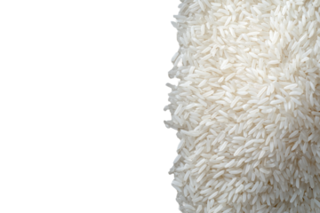 Close-up of uncooked white rice grains.  A portion of a bag of rice is shown, filling the right side of the image, against a plain black background.  